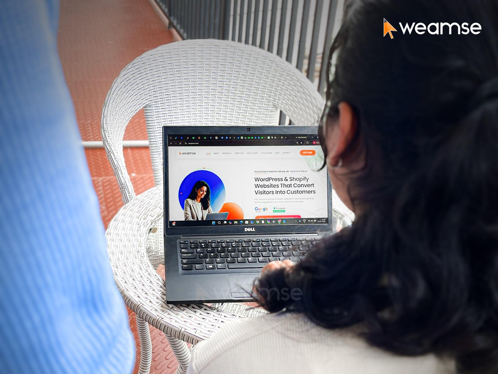 A team member reviewing the WEAMSE website