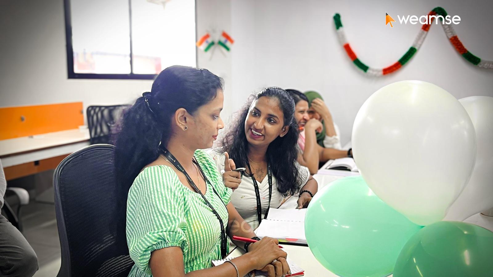 Team members at the office Independence Day celebration
